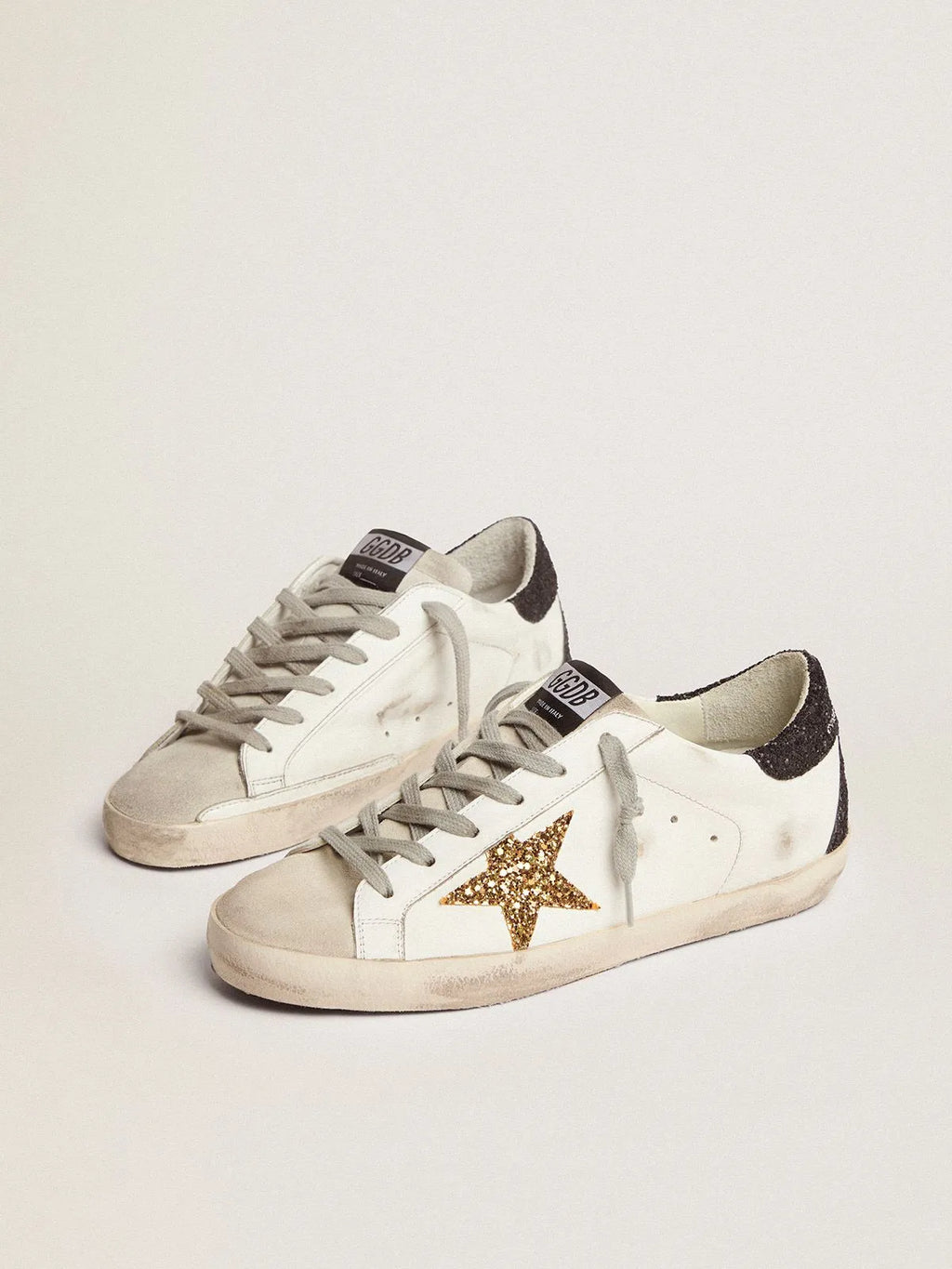 Super-Star sneakers with gold star and glittery black heel tab B40716