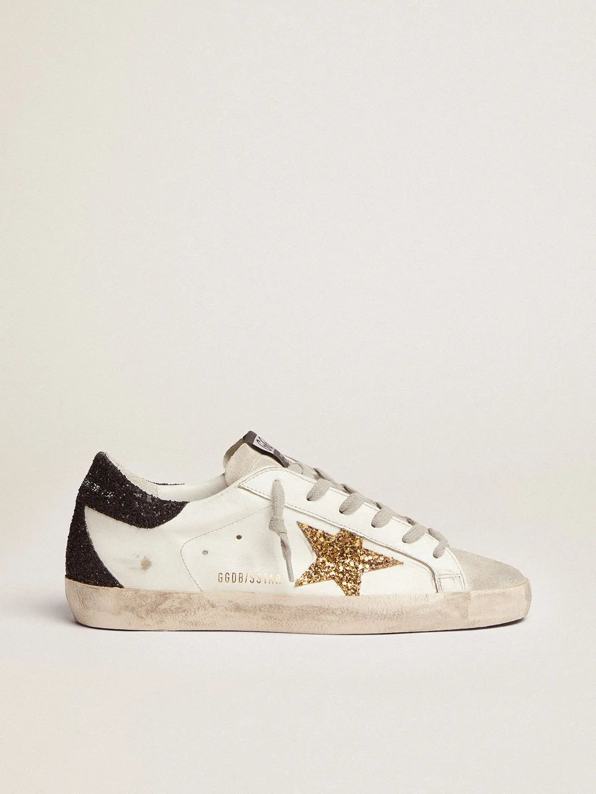 Super-Star sneakers with gold star and glittery black heel tab B40716