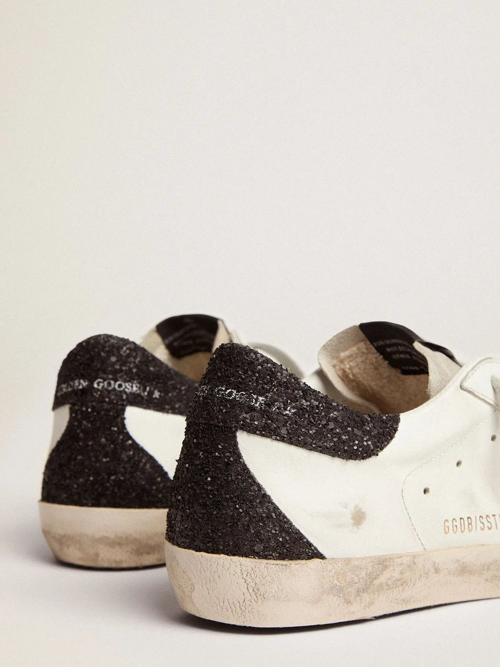 Super-Star sneakers with gold star and glittery black heel tab B40716