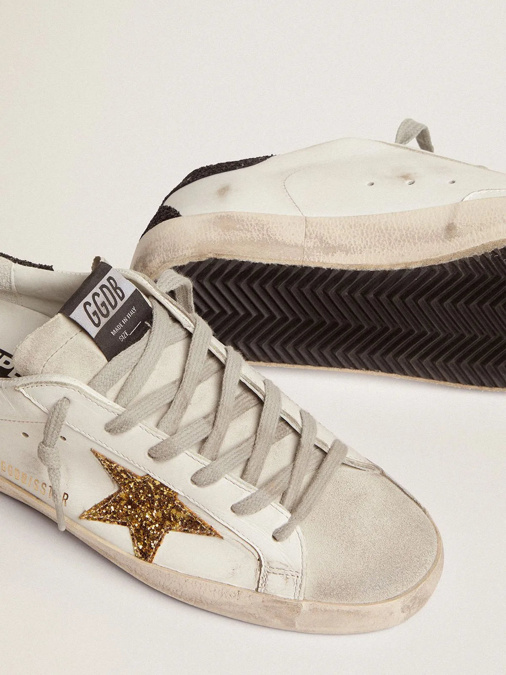 Super-Star sneakers with gold star and glittery black heel tab B40716